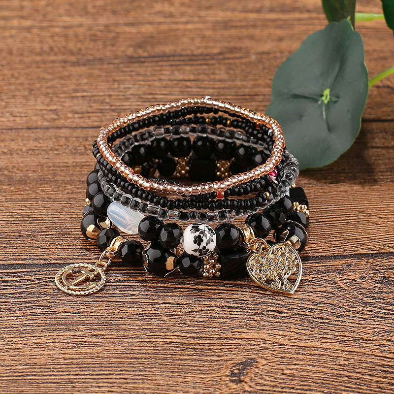 Pulsera con cuentas de múltiples colgantes cuidadas al por mayor